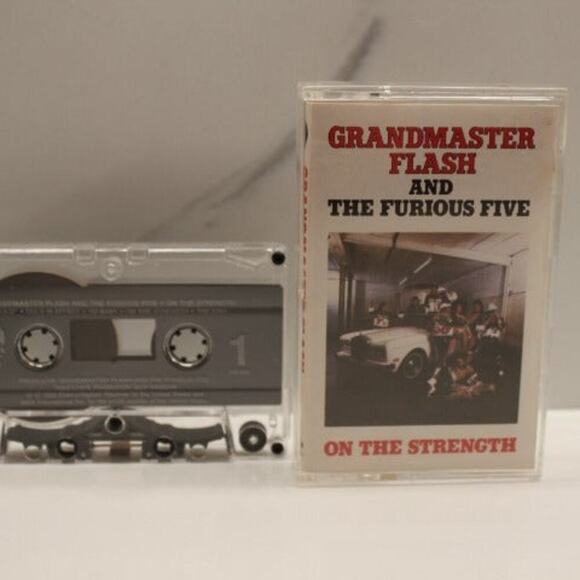 Grandmaster Flash and The Furious Five - On The Strength NEAR MINT Cassette 1988 - Picture 1 of 4